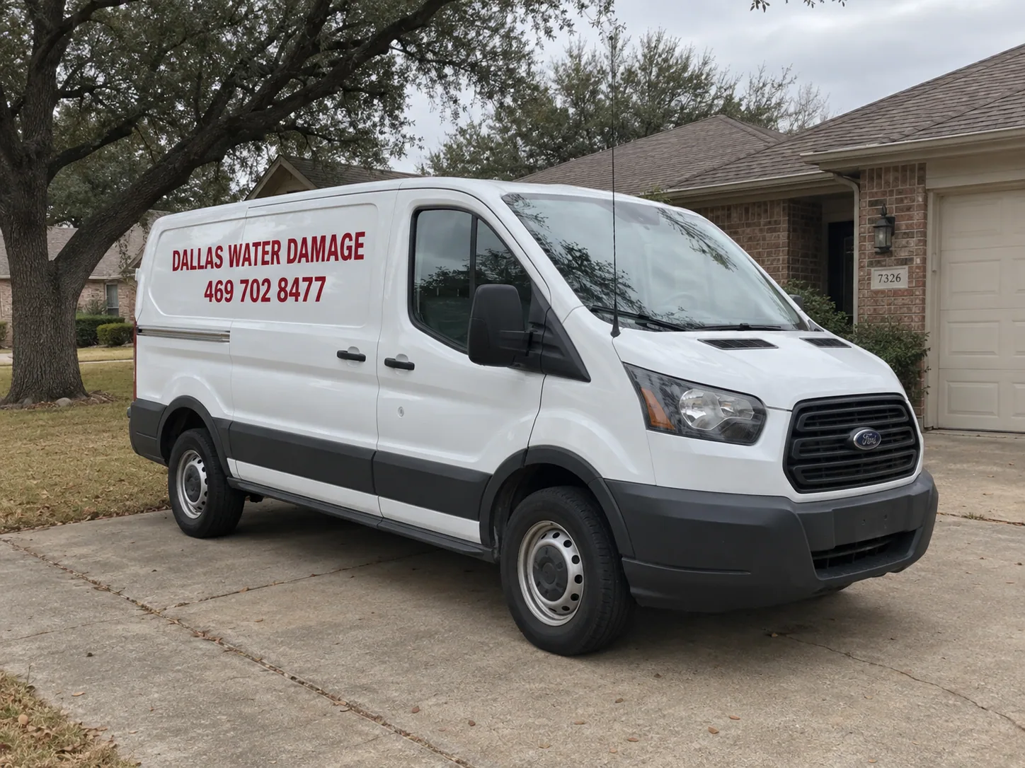 Dallas Water Damage work van parked on a driveway in Dallas, Texas